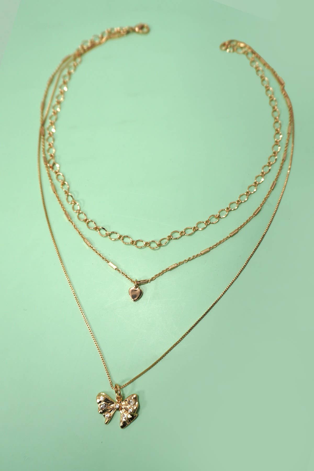 MULTI LAYERED BOW HEART NECKLACE | 80N1274: GOLD