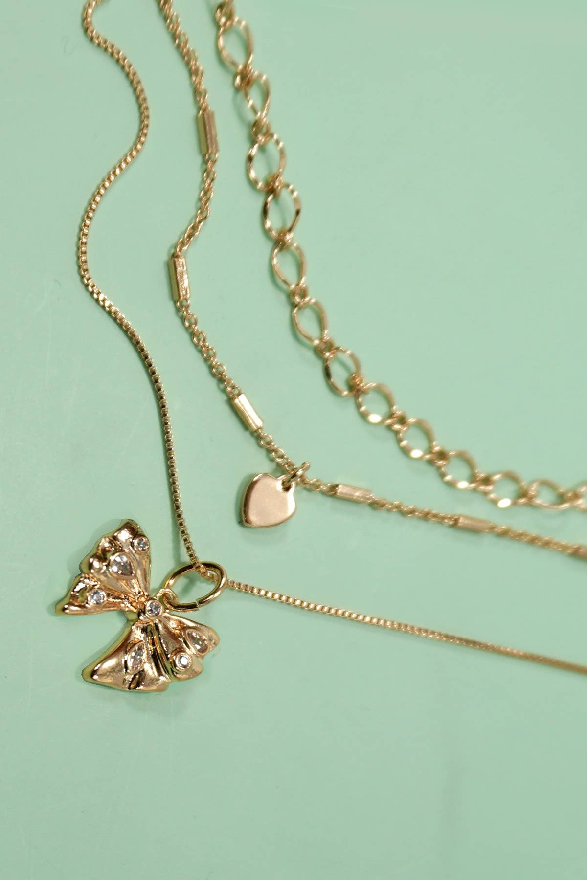 MULTI LAYERED BOW HEART NECKLACE | 80N1274: GOLD