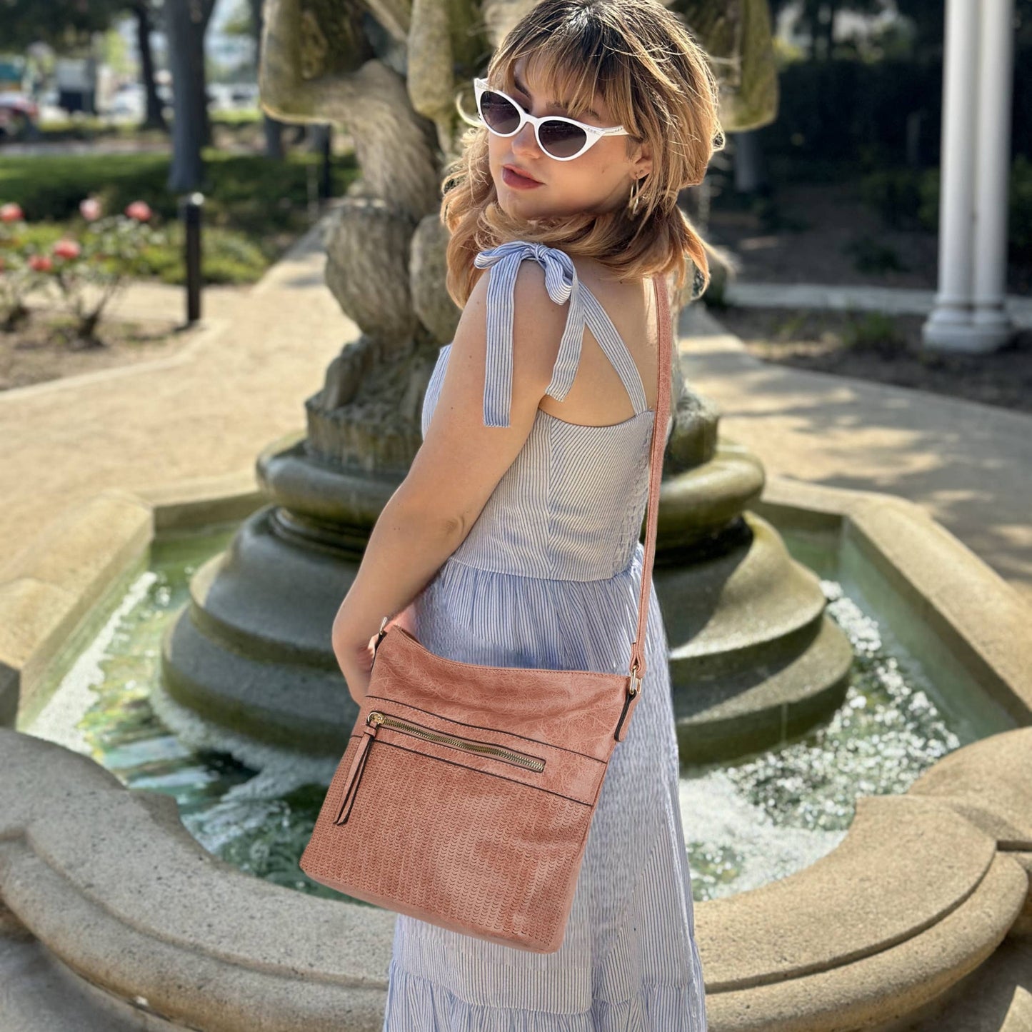 Alma Women Laser Cut Perforated Slouchy Crossbody Bag: Mauve