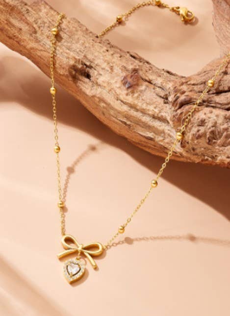 18K STAINLESS STEEL TARNISH FREE BOW NECKLACE: GOLD