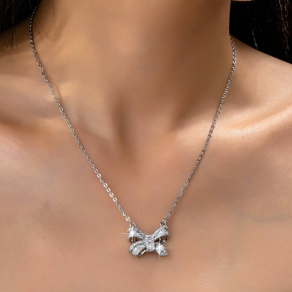Sparkling Crystal Bow Pendant Necklace: Silver