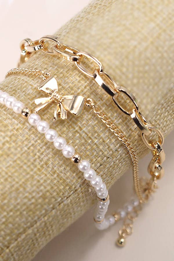 BOW PEARL LINK TRIO SET BRACELETS: GOLD