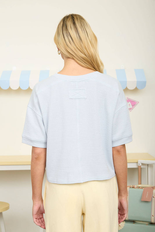 TEXTURED KNIT BUTTON DOWN SHORT SLEEVE CARDIGAN: LIGHT BLUE