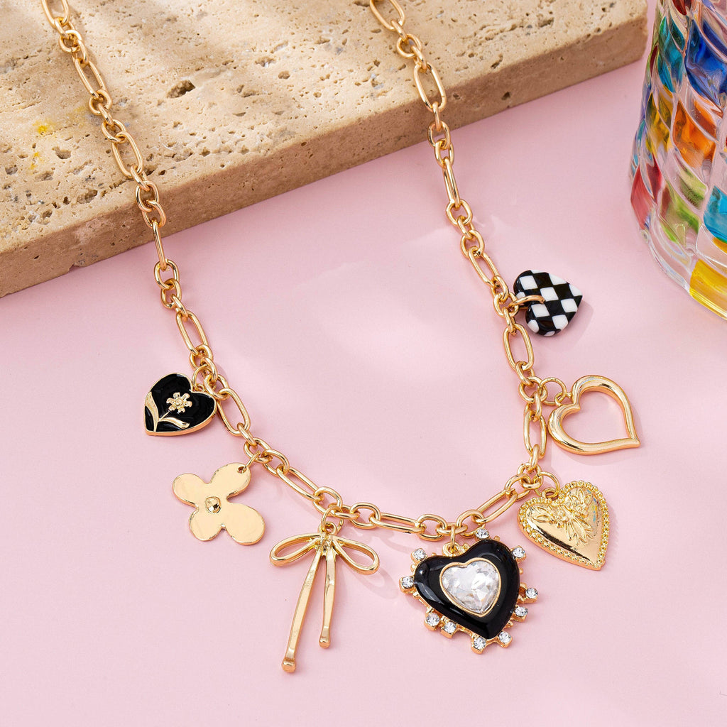 CHARM NECKLACE-BOW CHECKER HEART RHINESTONE: GOLD