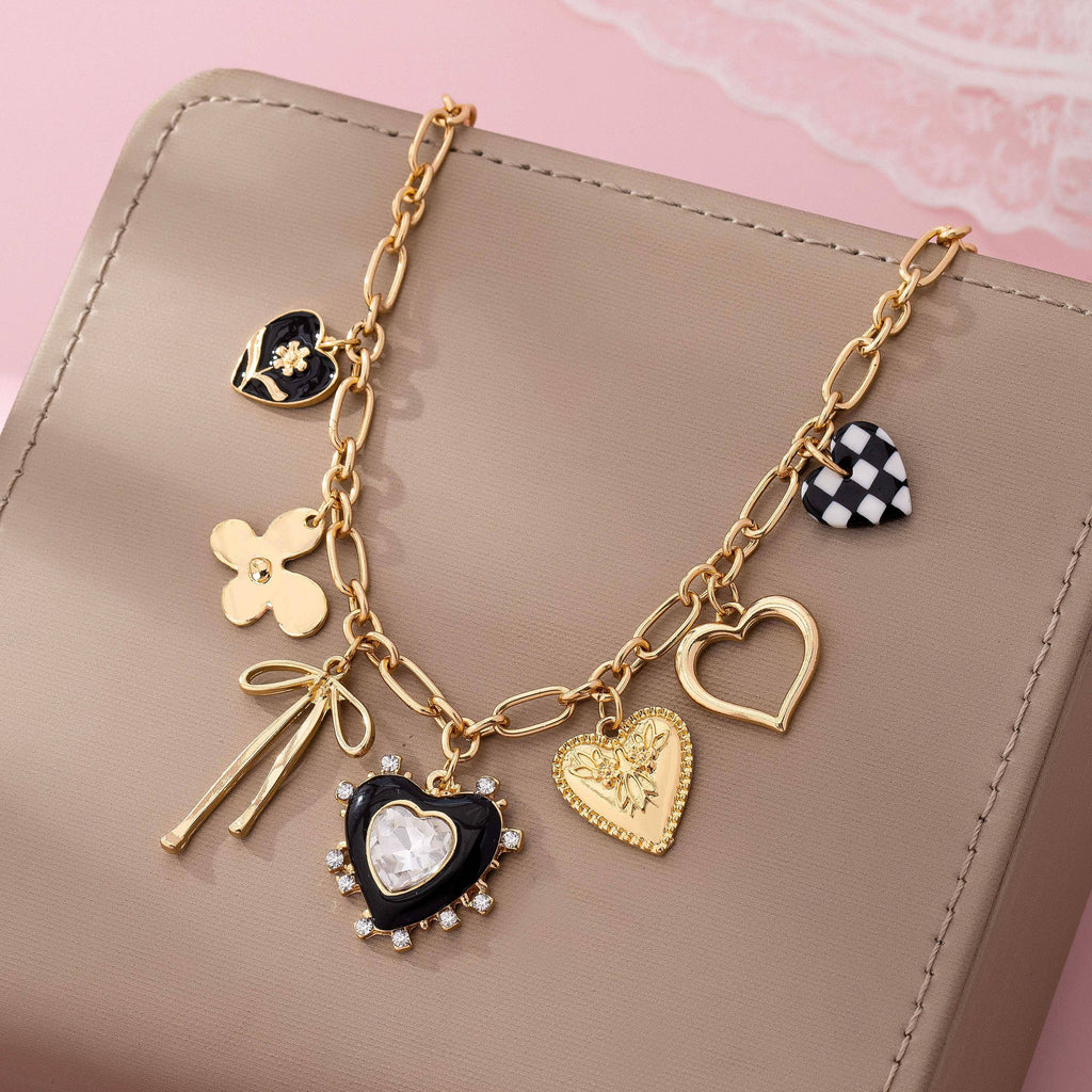 CHARM NECKLACE-BOW CHECKER HEART RHINESTONE: GOLD