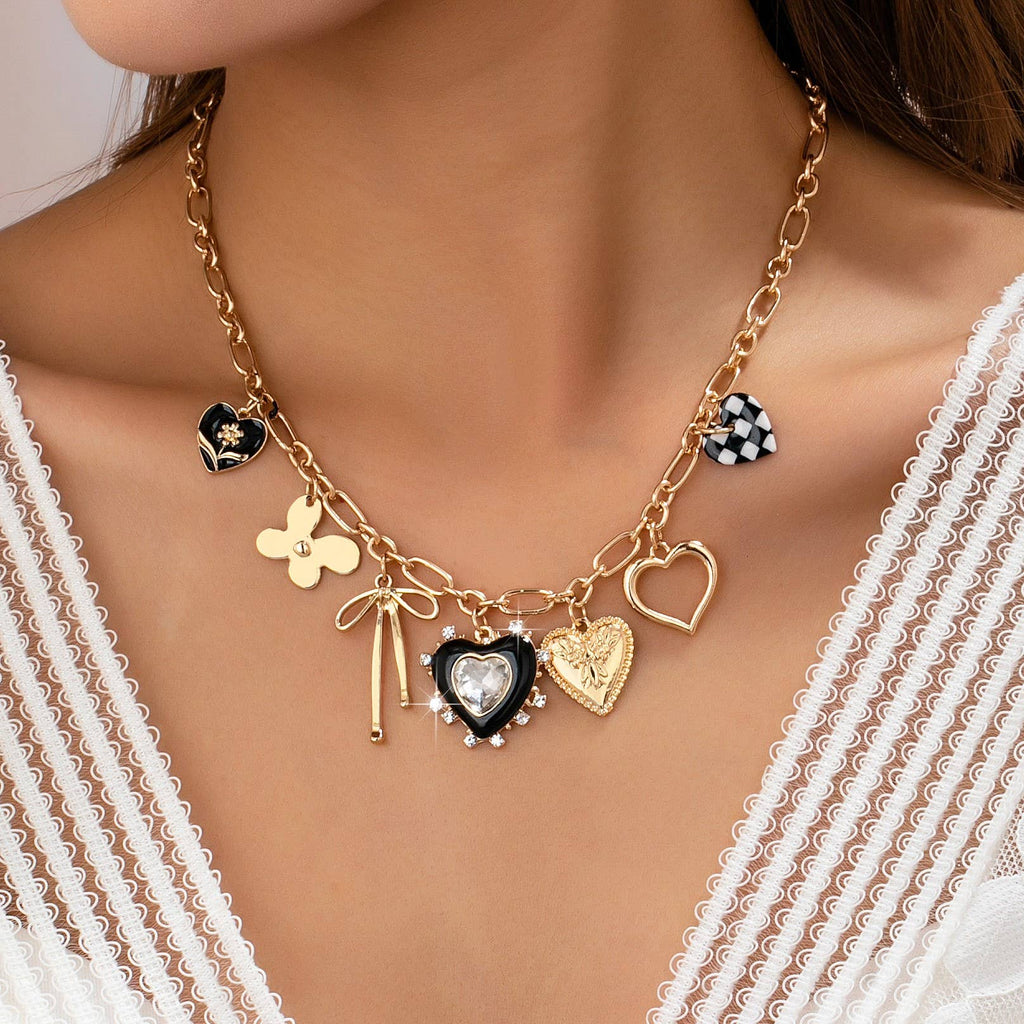 CHARM NECKLACE-BOW CHECKER HEART RHINESTONE: GOLD