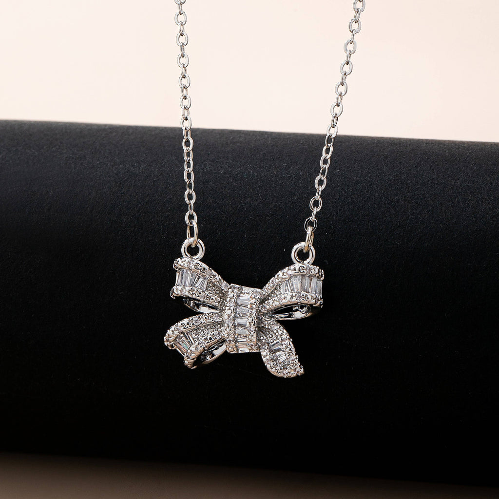 Sparkling Crystal Bow Pendant Necklace: Silver