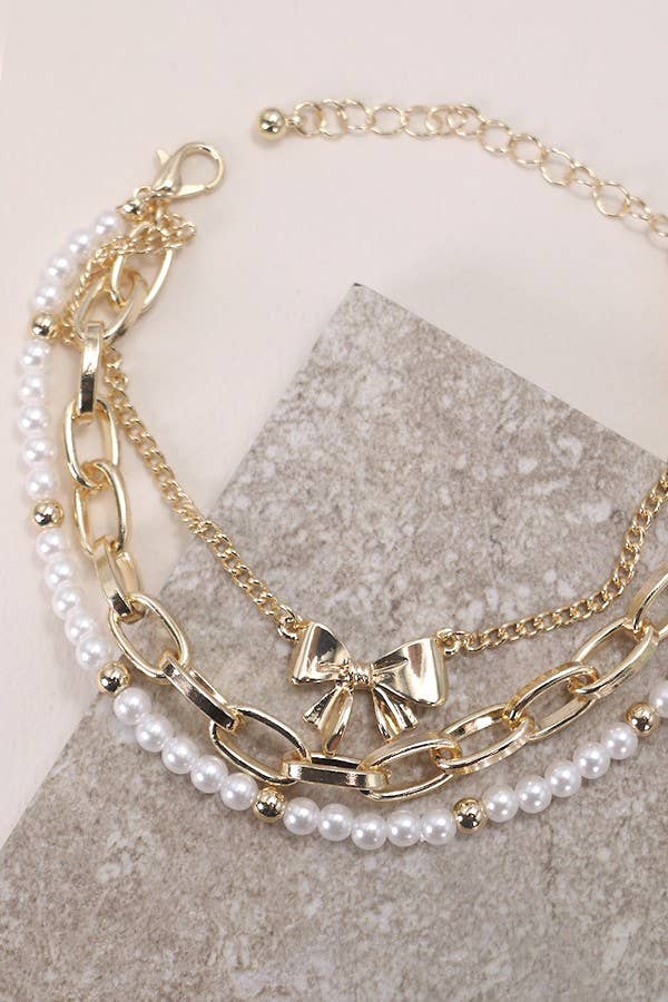 BOW PEARL LINK TRIO SET BRACELETS: GOLD