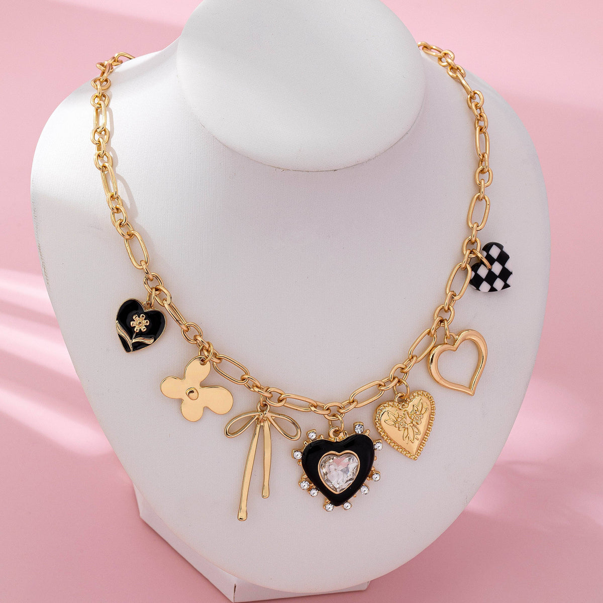 CHARM NECKLACE-BOW CHECKER HEART RHINESTONE: GOLD