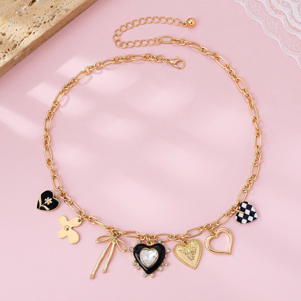 CHARM NECKLACE-BOW CHECKER HEART RHINESTONE: GOLD