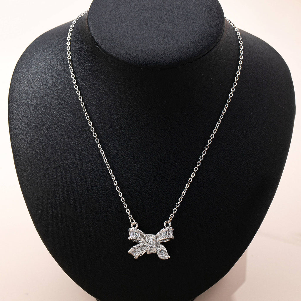 Sparkling Crystal Bow Pendant Necklace: Silver