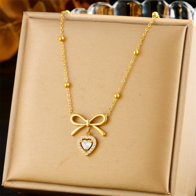 18K STAINLESS STEEL TARNISH FREE BOW NECKLACE: GOLD