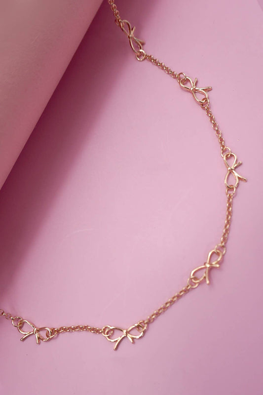 CUTOUT BOW STATION NECKLACE | Gold